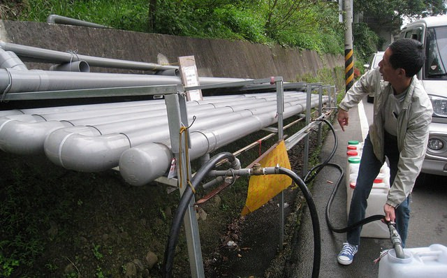 local people fill water